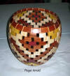 Open segmented hollow form by Roger Arnold